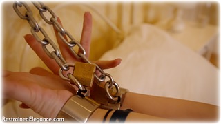 Bondage photo pic picture Faye barefoot, globe cuffs, bedroom, bit gag, shackles, skirt, sm factory, brunette, leg irons, spreadeagled, lingerie, chains, collar, nude